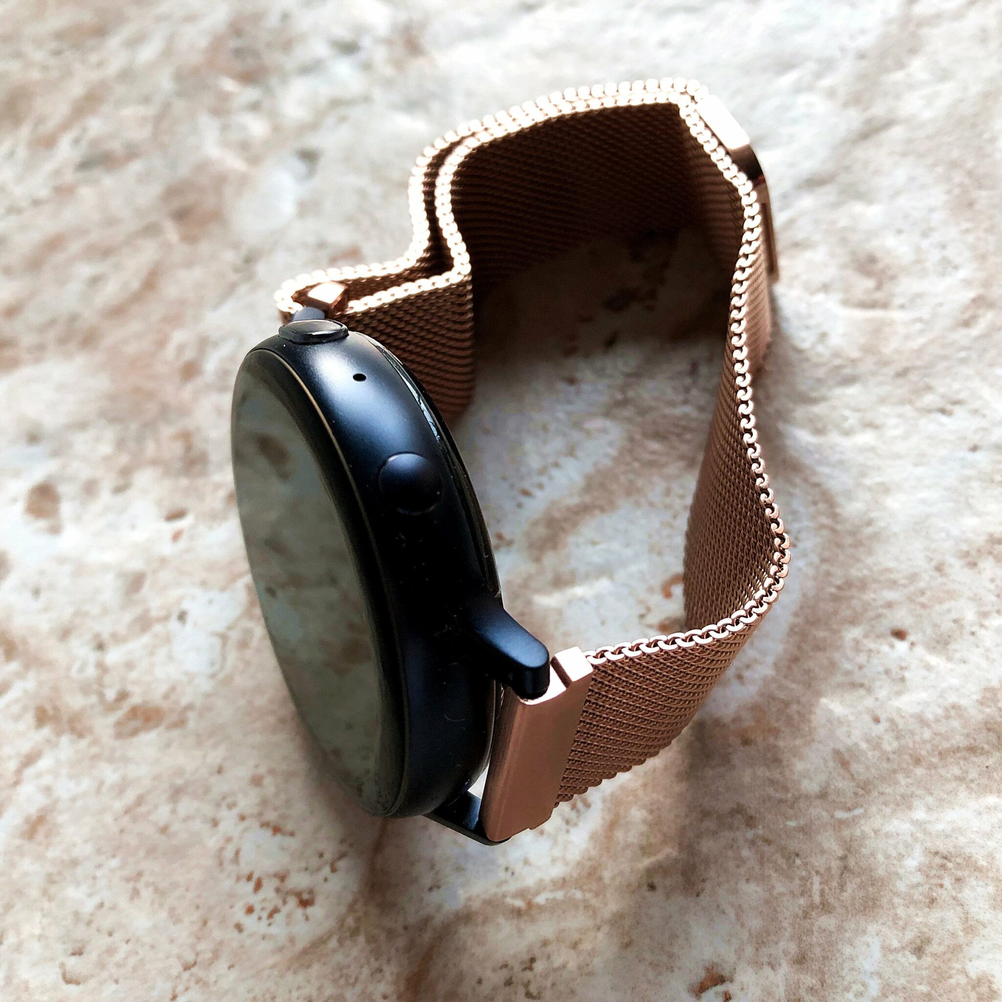 rose gold samsung watch with black band